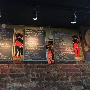 menus on a brick wall