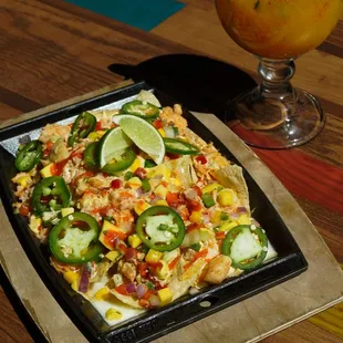 Try flavor packed menu options like our Lobster &amp; Crab Nacho and Mexican Candy Margarita.