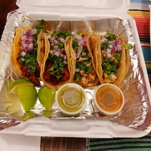2 chicken mini tacos. 2 pork mini tacos.