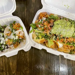 two containers of nachos