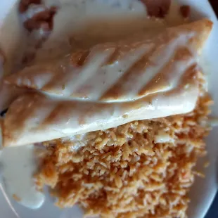 Chimichanga with beans and rice.  Top with queso