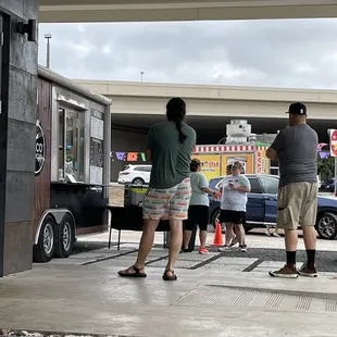 a group of people standing outside
