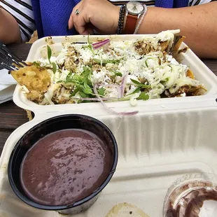 Chilaquiles and refried black beans