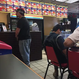 two men sitting at a table