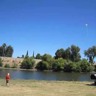 Chance flying his new kite at Turtle Beach.