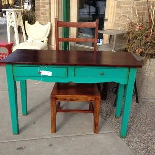 Desk and chair from Nadeau, with the store's entrance in the background. This is my favorite piece of furniture!