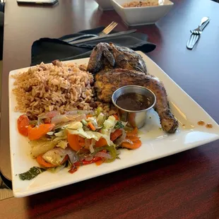 Jerk chicken w/ mixed veggies and rice and beans