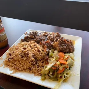 Oxtail w/ butter beans, mixed veggies, and red beans and rice