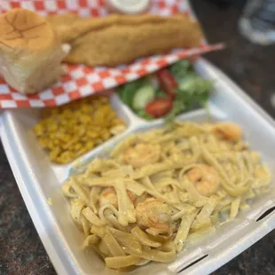 a meal in a styrofoam container