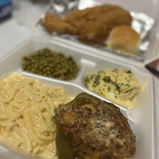 a meal in a styrofoam container