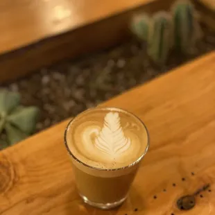 Succulent coffee table &amp; an oat milk cappuccino