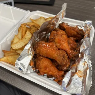 Hot wings and fries.