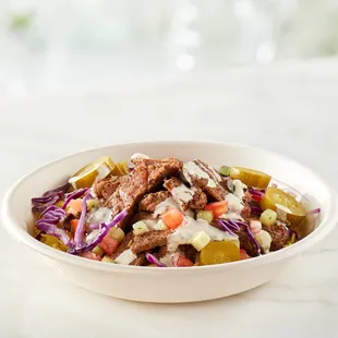 a bowl of meat and vegetables