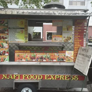 a food truck parked on the side of the road