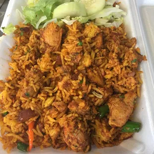 chicken and rice in a styrofoam container