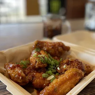 chicken wings in a styrofoam container