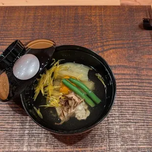 The soup was light and naturally sweet, with a strong mushroom flavor. It was a broth made with yuba, sea urchin, and eggplant. It was my fi