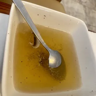 a bowl of soup with a spoon