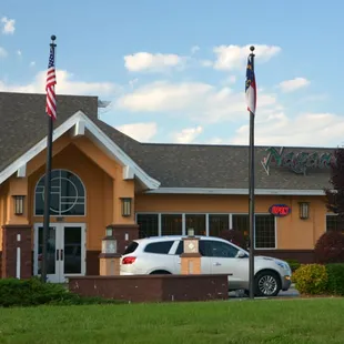 a car parked in front of the building