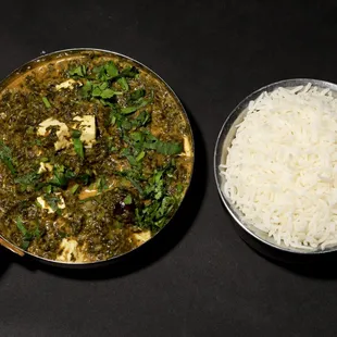 a bowl of rice and a pan of tofu