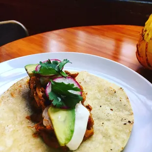 Tinga tacos! W/ avocado, cumin lime crema, radish, cilantro
