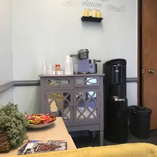 Waiting area has a Keurig and candy