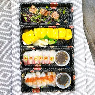 Mango tuna roll, Hamachi chili, Waygu beef tartare, bass sashimi