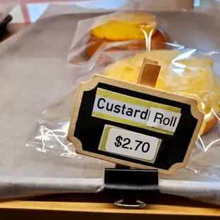 a sign for a custard roll