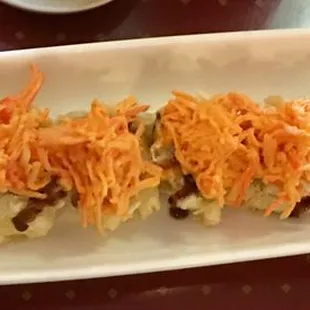 Volcano Roll. Husband said it was good, but I'm not so sure about the color of the crab on top?