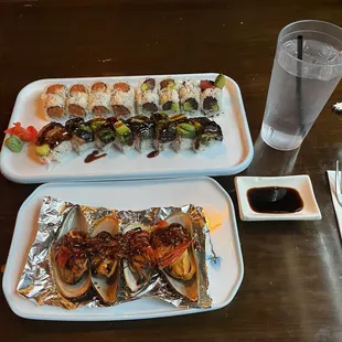 Baked green mussels, spicy tuna roll, tuna avocado roll, dragon roll