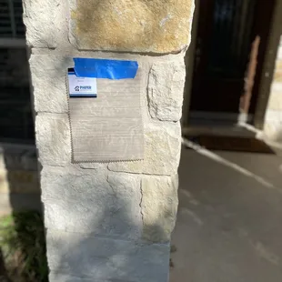 A swatch of Suntex 80 next to a house.