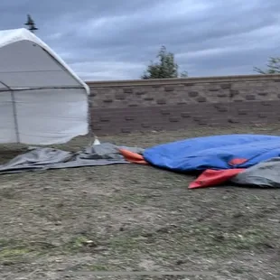 Free flying canopy and jumper in wind &amp; gust- poor Job done to secure them.
