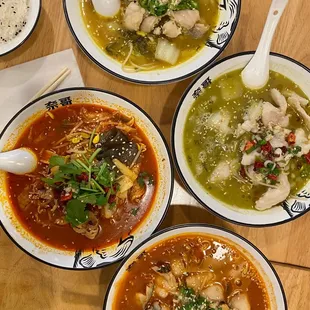 Signature Sauerkraut Fish, Golden Pickle Fish, Sunshine Tomato Fish, and Sichuan Style Boiled Beef.