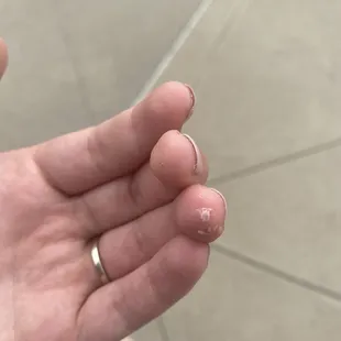 Nail polish on fingers