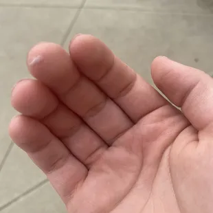 Nail polish on fingers