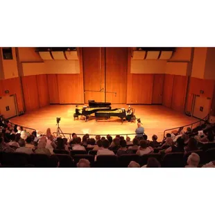 Naira playing a duo-piano recital at Fresno State