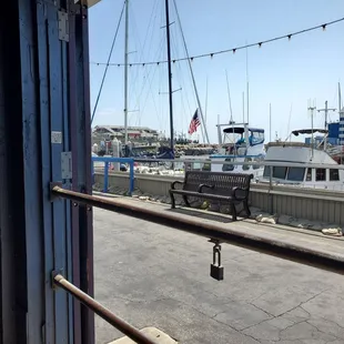 a view of boats docked in the harbor