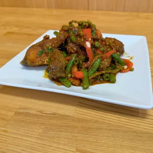 Southern Thai Style curry with deep-fried catfish steak.