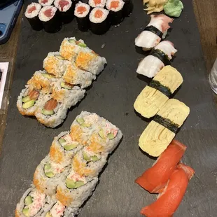 Salmon roll, tuna rolls, California roll, Seattle roll, octopus, egg, and salmon