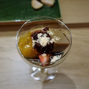 a dessert in a glass on a table