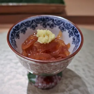 a small bowl of food on a table