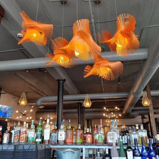 a bar filled with bottles of alcohol