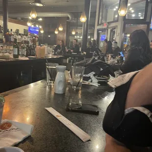 Bus tables and put it on. The bar right next to customers