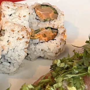 A spicy salmon roll. That is clearly not salmon. Smell is atrocious.