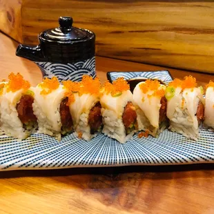 White pearl roll: spicy tuna with some type of white fish on top.  Must order!