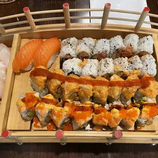 Scallop. Salmon, spicy tuna roll, spicy salmon roll, 2 special rolls from happy hour menu