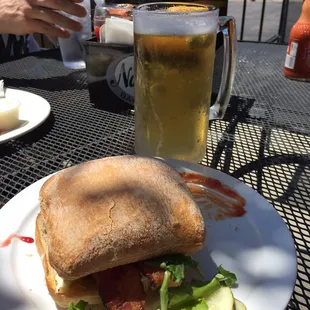 Has a nice 5 table patio. The selection of tap beers will please any level of beer drinker . Craft beer and main stream beer at good price.