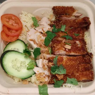 a meal in a styrofoam container