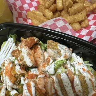 Fish Salad with a side of fries. When I say delicious it&apos;s delicious