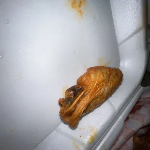 a burnt piece of pizza